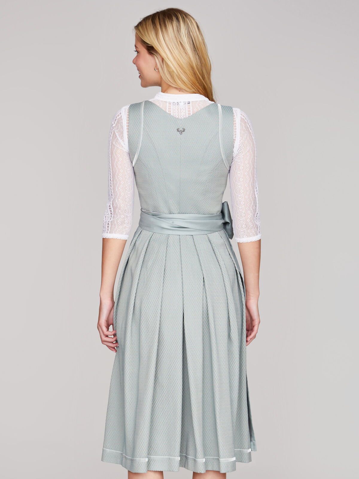 Cyanfarbenes Dirndl Monochrome Rückenansicht