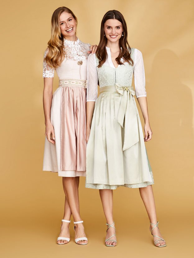 Zwei festliche Dirndl in Rosa und Grün