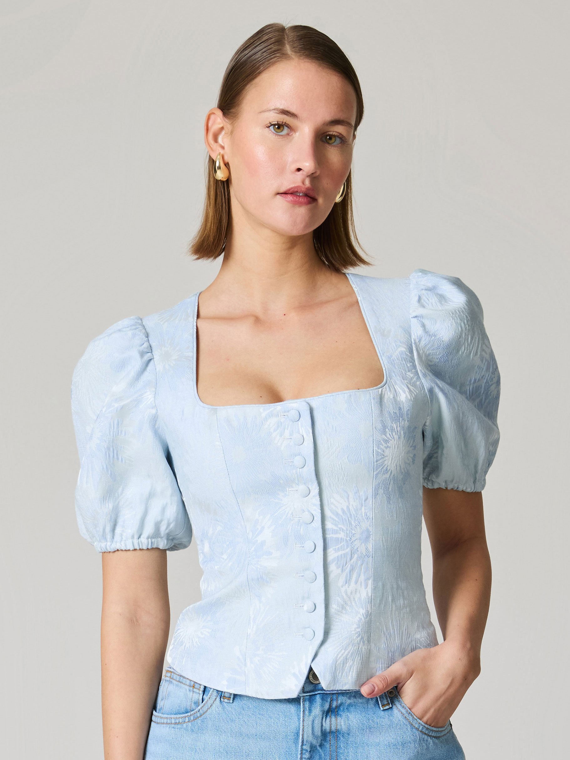 Mieder in Hellblau mit Blumenmuster