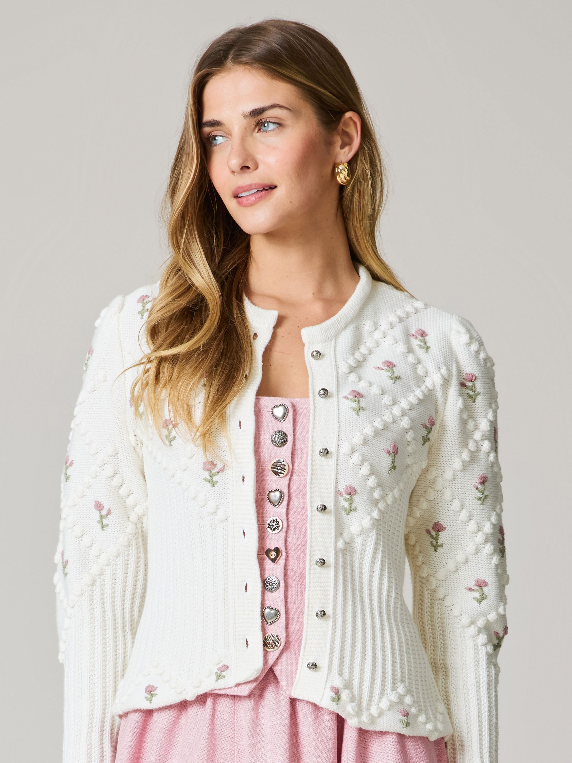 Strickjacke in cremeweiß mit rosa Blumenstickerei