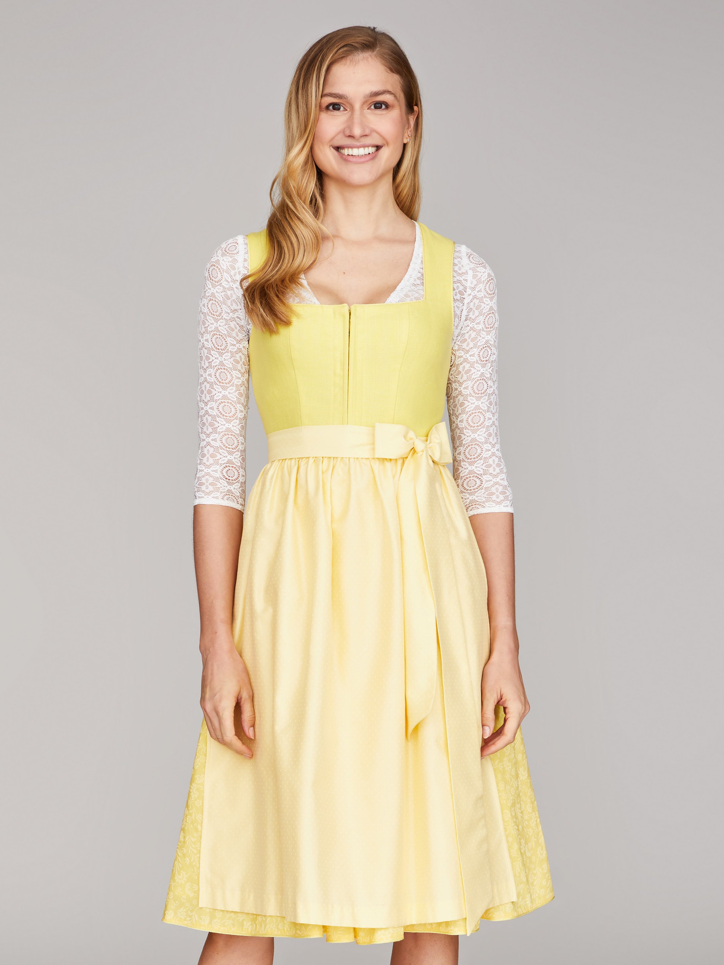 Zitronengelbes Dirndl mit Leinenmieder