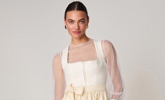 Dirndl mit Schnursteppung in Gelb  Dirndl mit Schnursteppung in Gelb