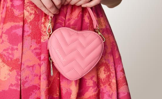 Kleine Rosa Tasche in Herzform Kleine Rosa Tasche in Herzform