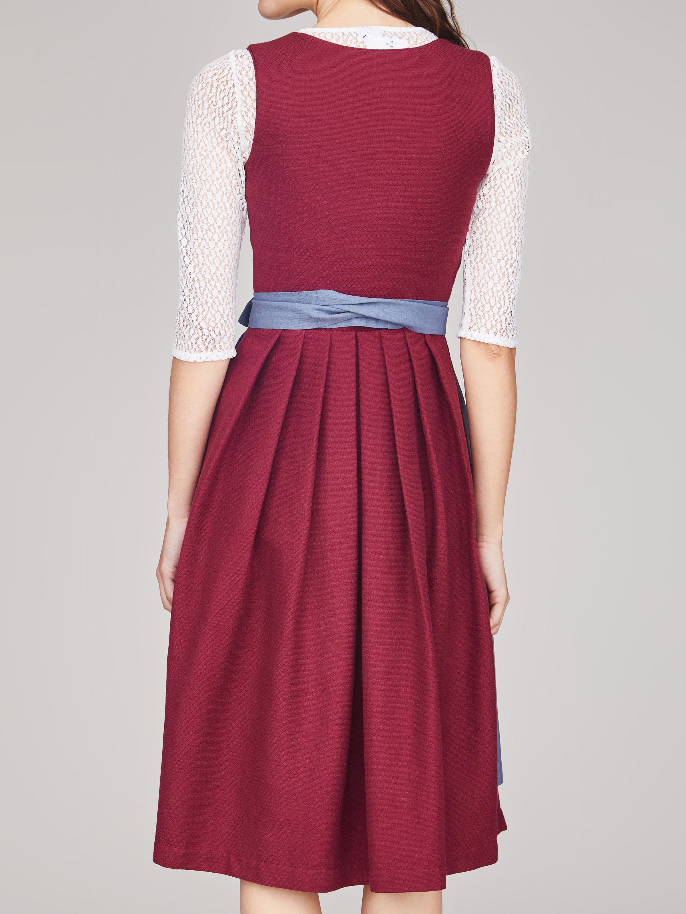 Rubinrotes strukturiertes Dirndl Rubinrotes strukturiertes Dirndl
