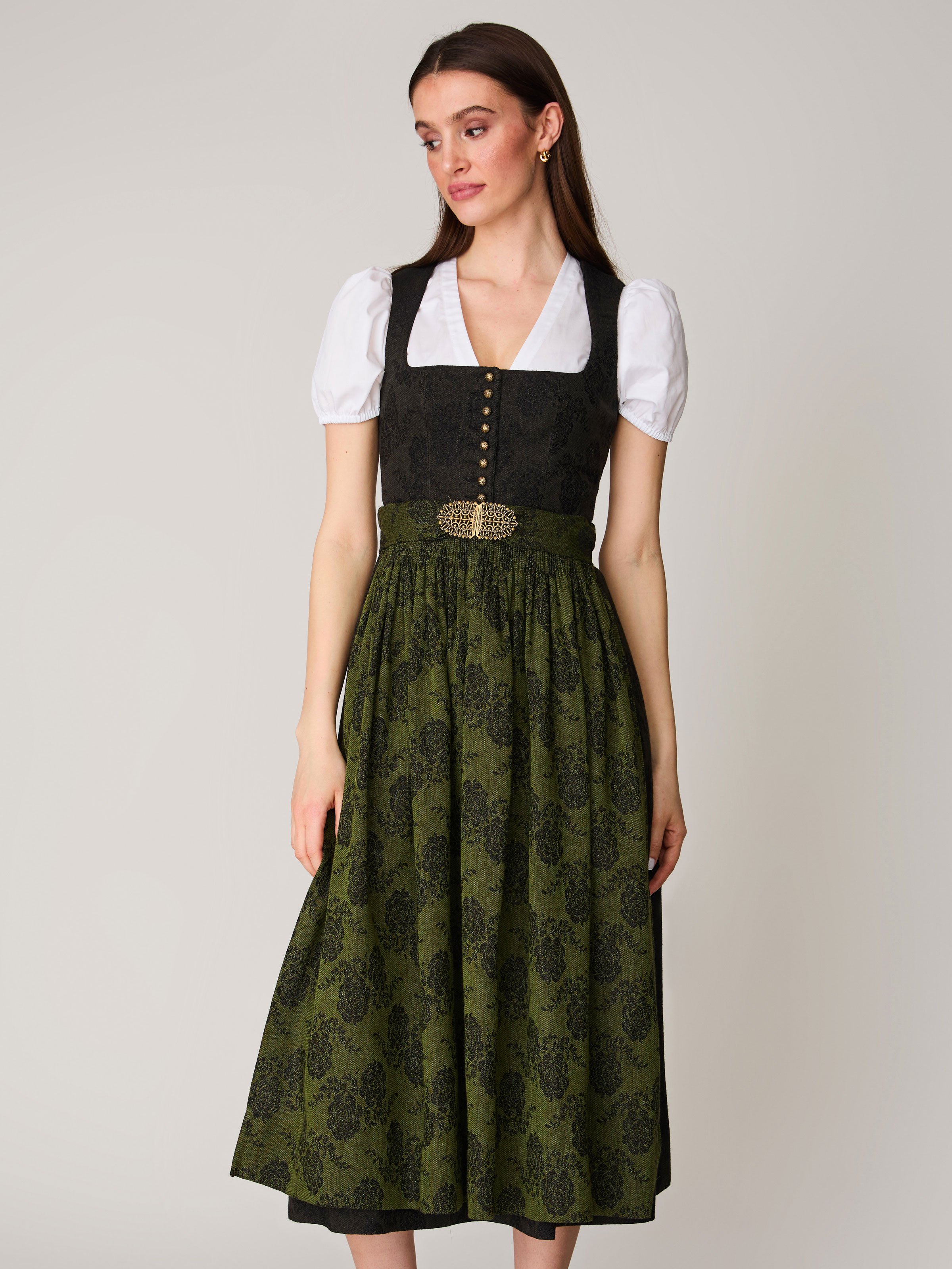 Dirndl in dunkelgrün mit floralem Muster