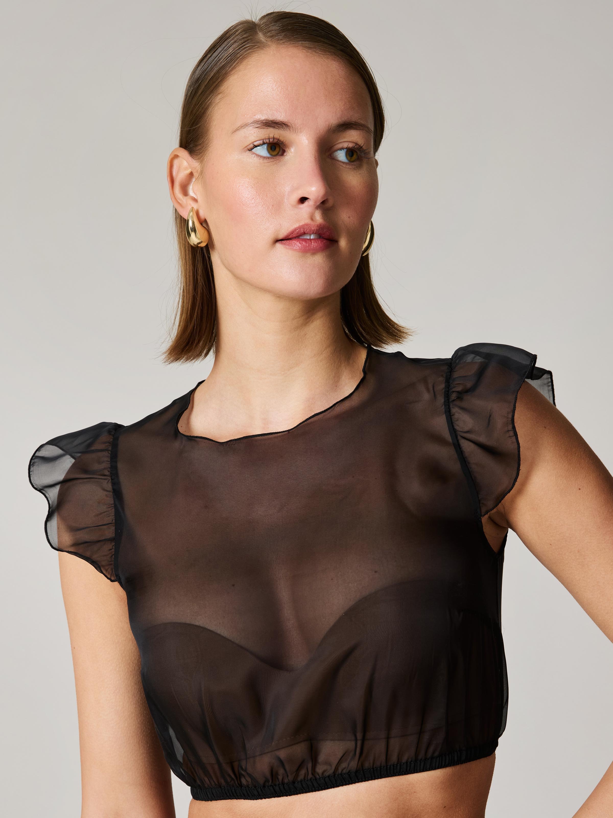 Transparente Bluse in Schwarz mit Flügelarm
