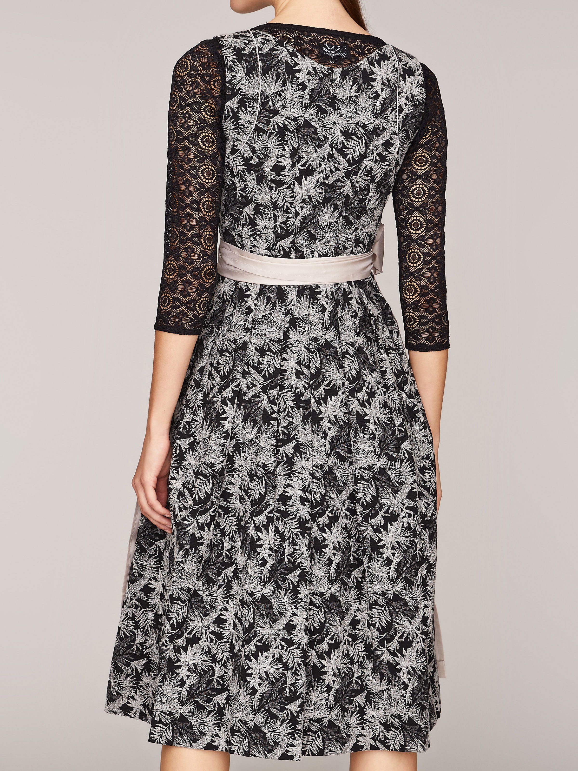 Schwarzes Dirndl mit weißem Palmenmuster Schwarzes Dirndl mit weißem Palmenmuster
