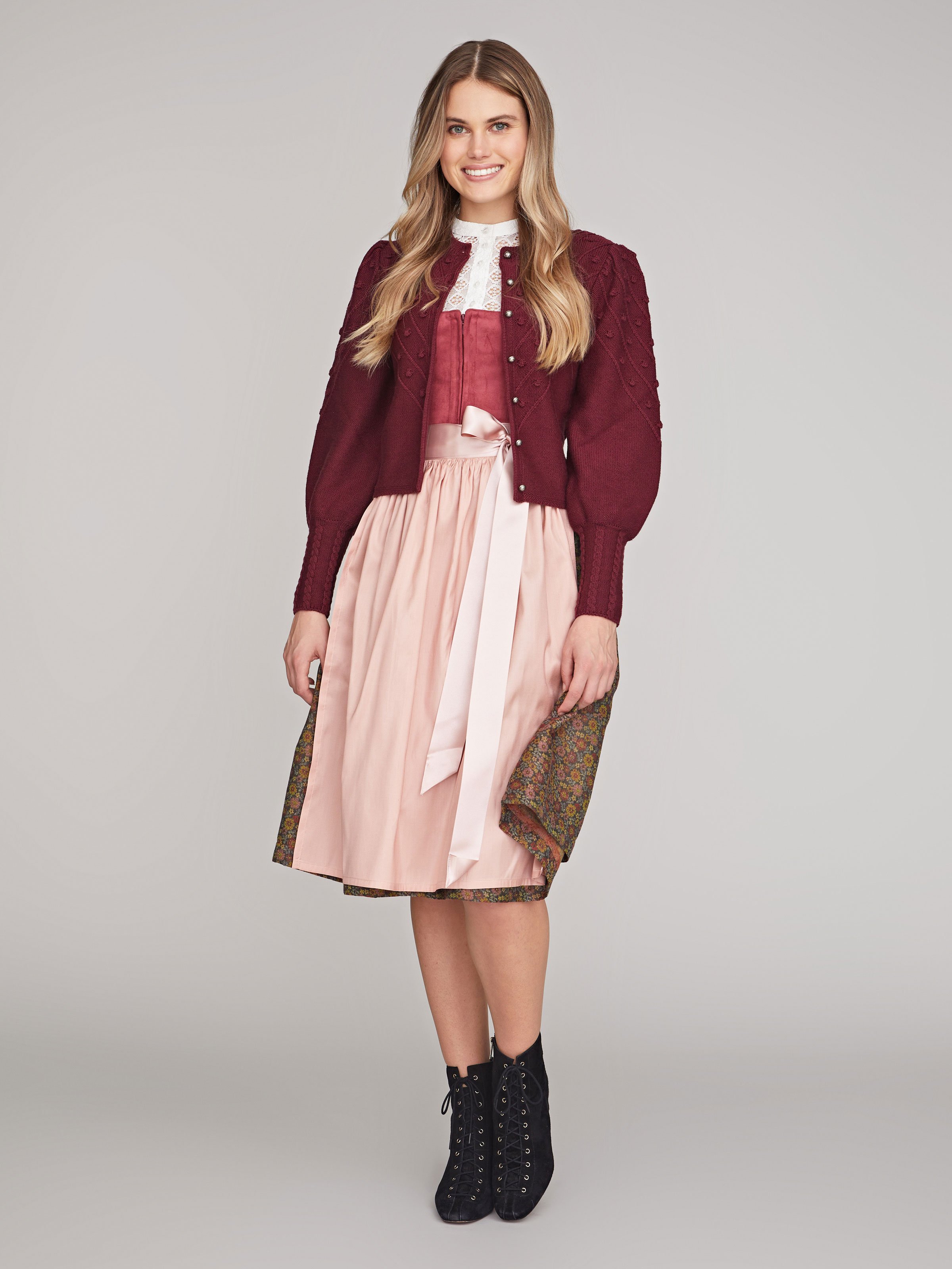 Weinrote Strickjacke mit Puffarm Weinrote Strickjacke mit Puffarm