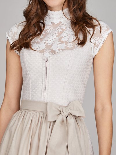 Cremefarbenes Dirndl mit Herzausschnitt Cremefarbenes Dirndl mit Herzausschnitt