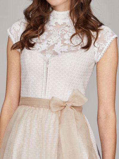 Cremefarbenes Dirndl mit Herzausschnitt Cremefarbenes Dirndl mit Herzausschnitt