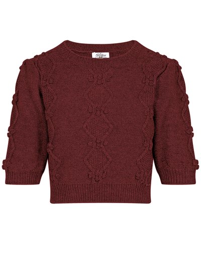 Dunkelroter Strickpullover mit aufwendigem Muster