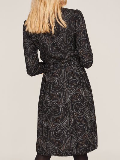 Schwarz gemustertes Blusenkleid mit Rüschen