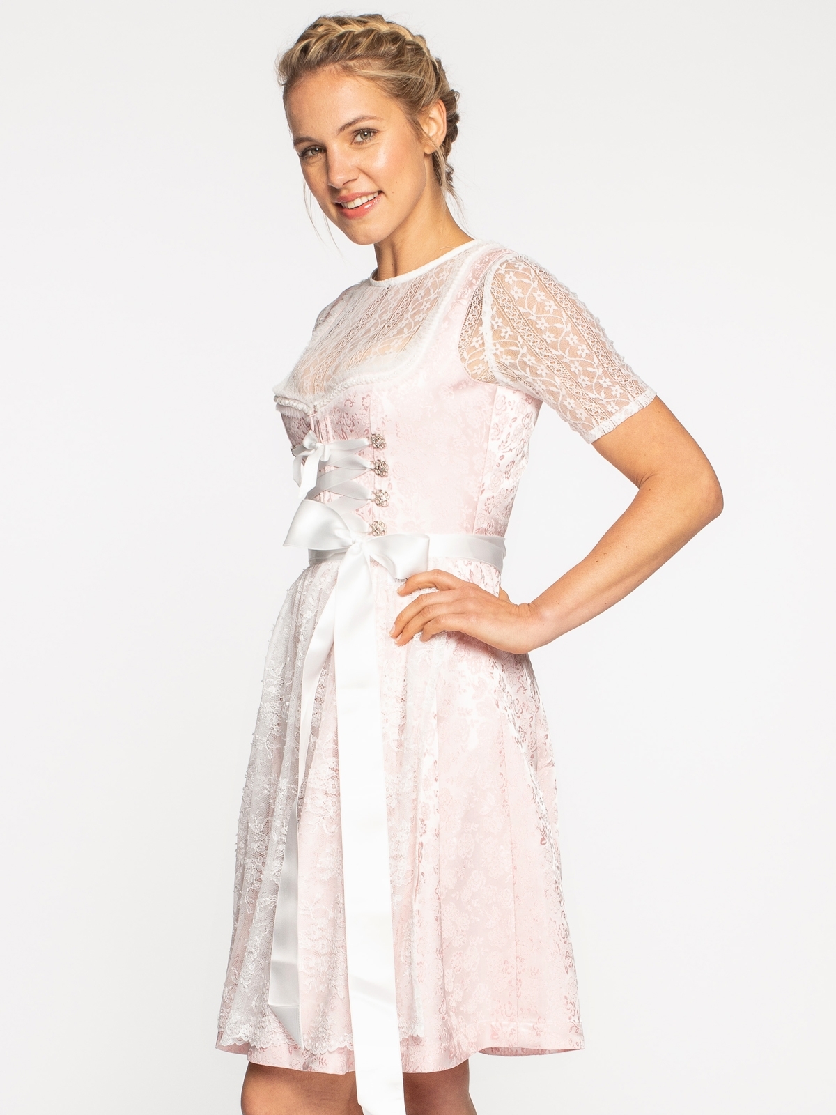 Dirndl in Rosa mit Spitzenschürze Dirndl in Rosa mit Spitzenschürze