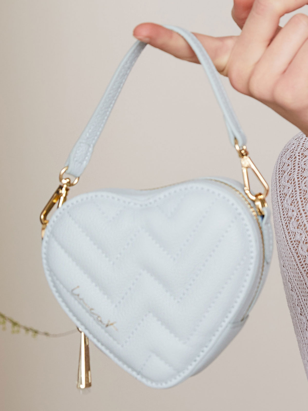 Hellblaue Mini-Tasche in Herzform Hellblaue Mini-Tasche in Herzform