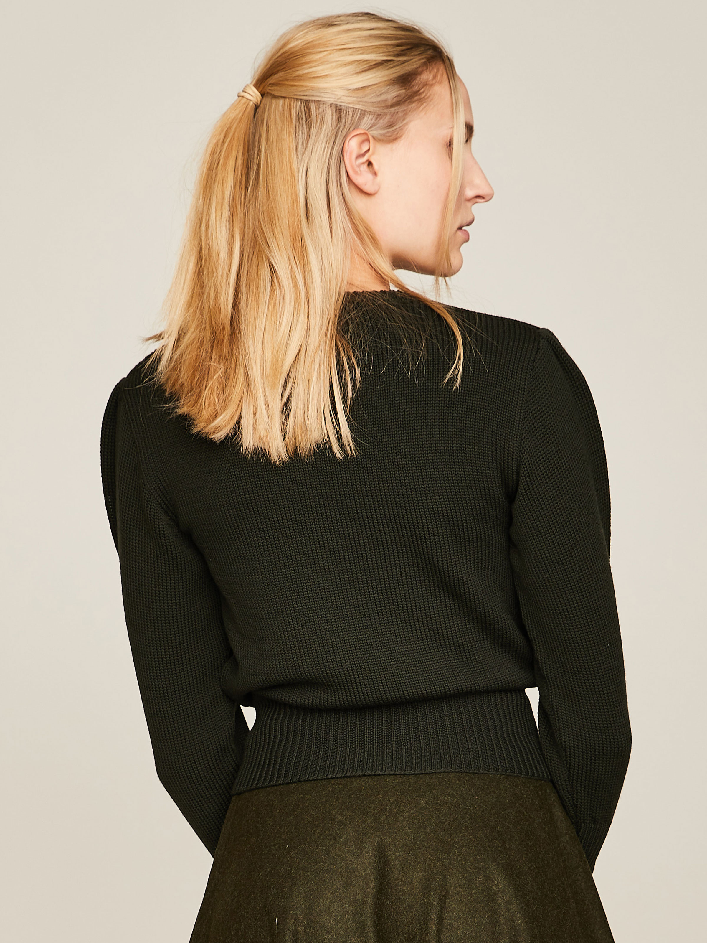 Dunkelgrüner Pullover aus Merinowolle Dunkelgrüner Pullover aus Merinowolle