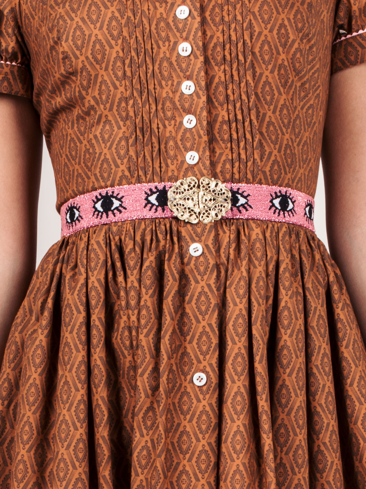 Pinker Stretch-Trachtengürtel mit Augen-Muster Pinker Stretch-Trachtengürtel mit Augen-Muster