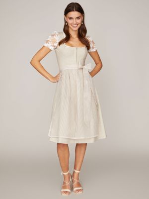 Beigefarbenes Dirndl mit zwei Schürzen Beigefarbenes Dirndl mit zwei Schürzen