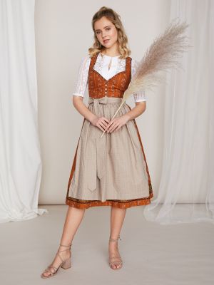 Senfgelbes Dirndl mit hellem Trachtenmuster Senfgelbes Dirndl mit hellem Trachtenmuster