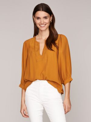 Hellbraune Bluse mit Puffärmeln Hellbraune Bluse mit Puffärmeln