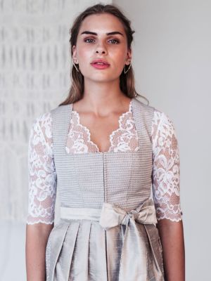 Beiges Leinen-Dirndl mit Seidenschürze Beiges Leinen-Dirndl mit Seidenschürze