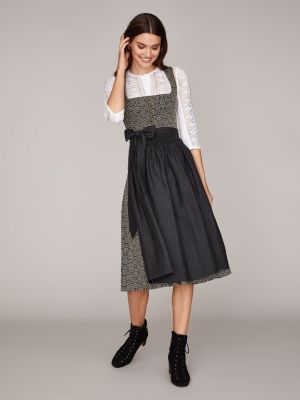 Gemustertes Dirndl in Erdtönen mit Leinen-Schürze Gemustertes Dirndl in Erdtönen mit Leinen-Schürze