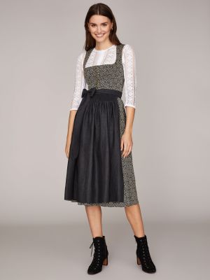 Gemustertes Dirndl in Erdtönen mit Leinen-Schürze Gemustertes Dirndl in Erdtönen mit Leinen-Schürze